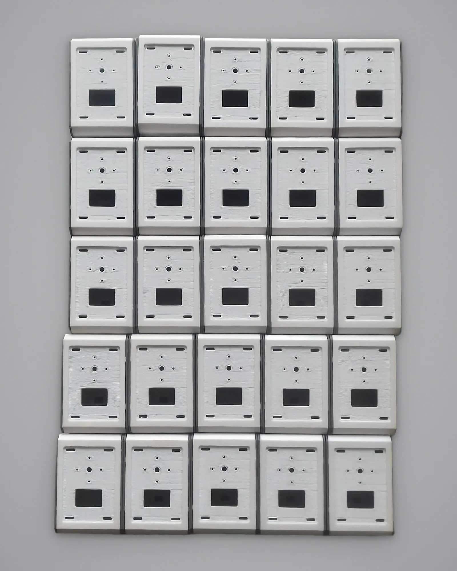 Batch of 25 identical 3D-printed electronic enclosure lids